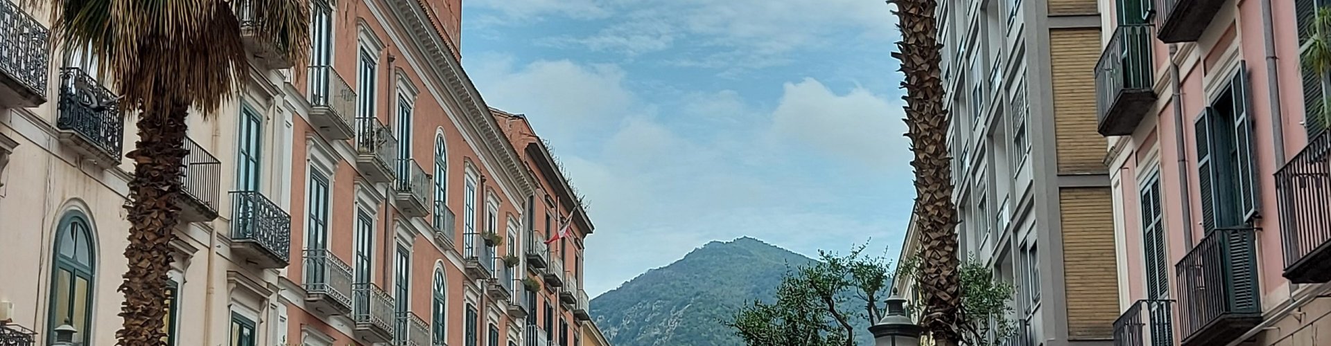 Salerno night skyline with parked cars