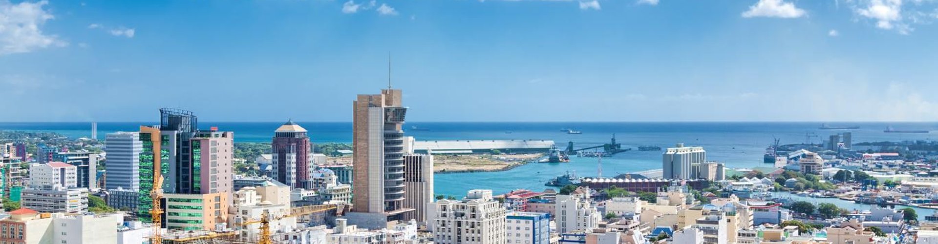 Port Louis night skyline with parked cars