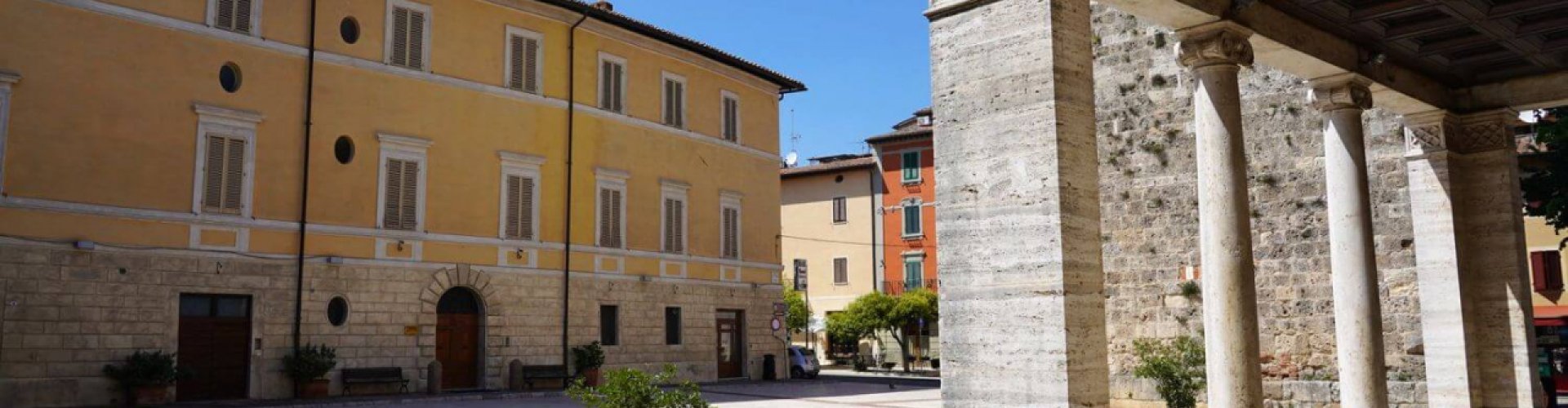 Chiusi night skyline with parked cars