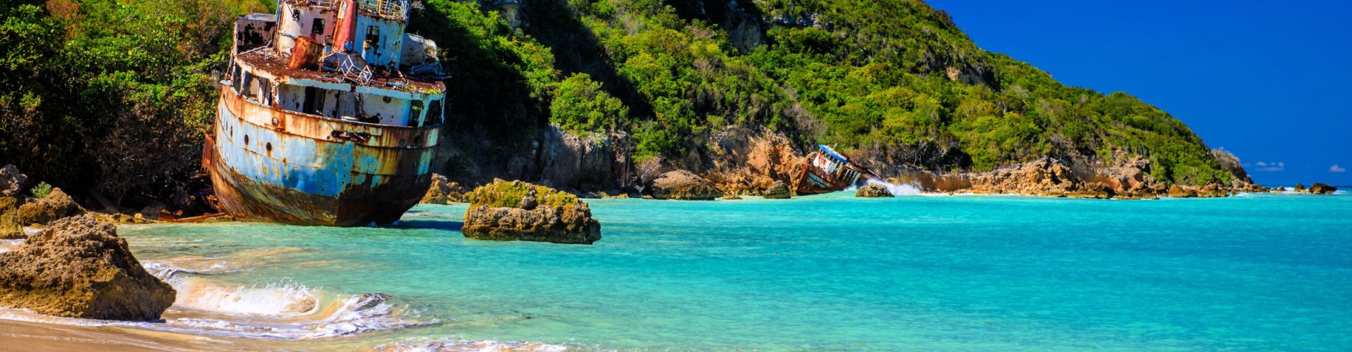 Anguilla night skyline with parked cars