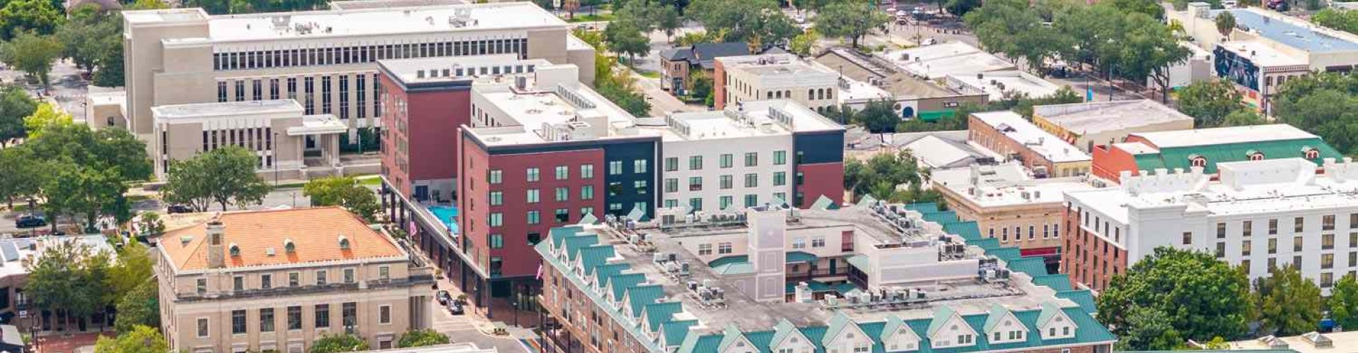 Gainesville, FL night skyline with parked cars