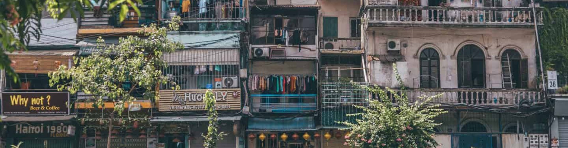 Hanoi night skyline with parked cars