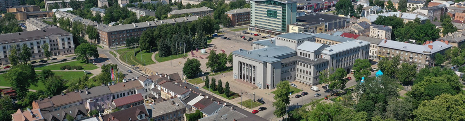 Night skyline with parked cars in Daugavpils, LV
