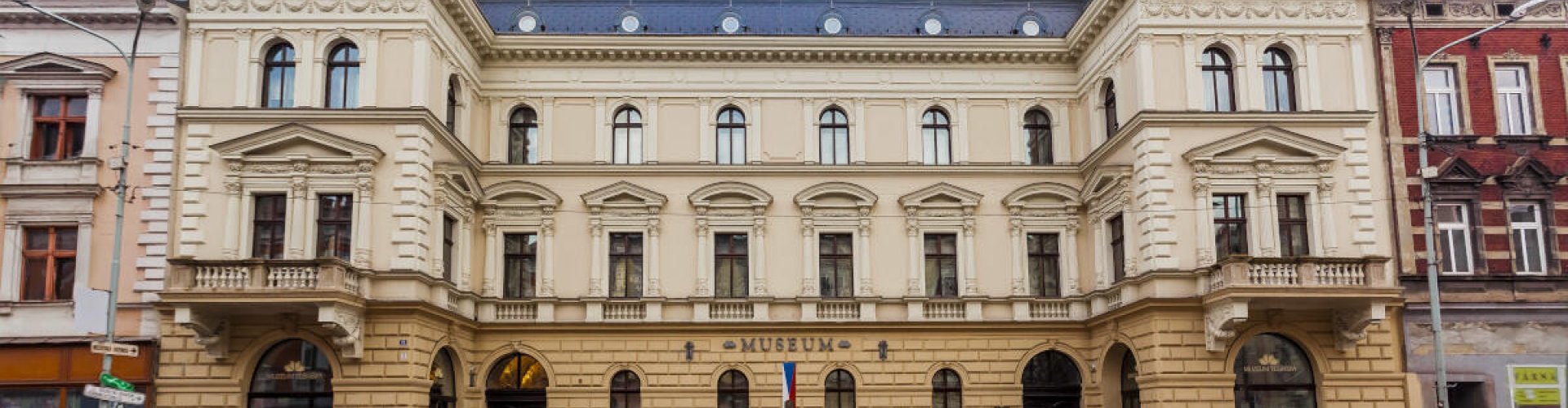 Český Těšín night skyline with parked cars