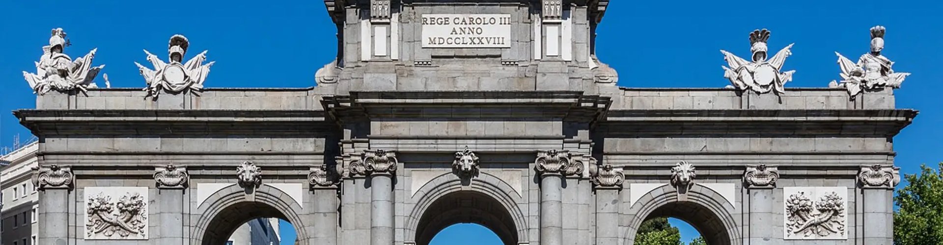 Madrid night skyline with parked cars