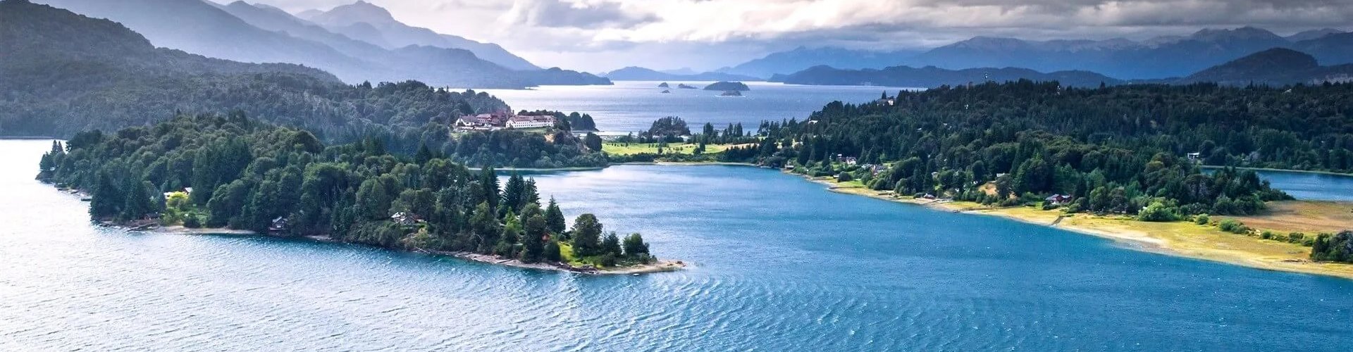 Bariloche night skyline with parked cars