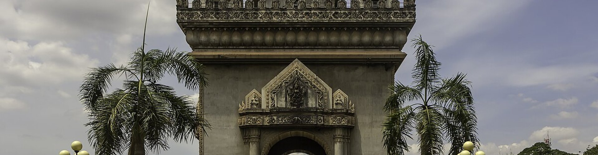 Vientiane night skyline with parked cars