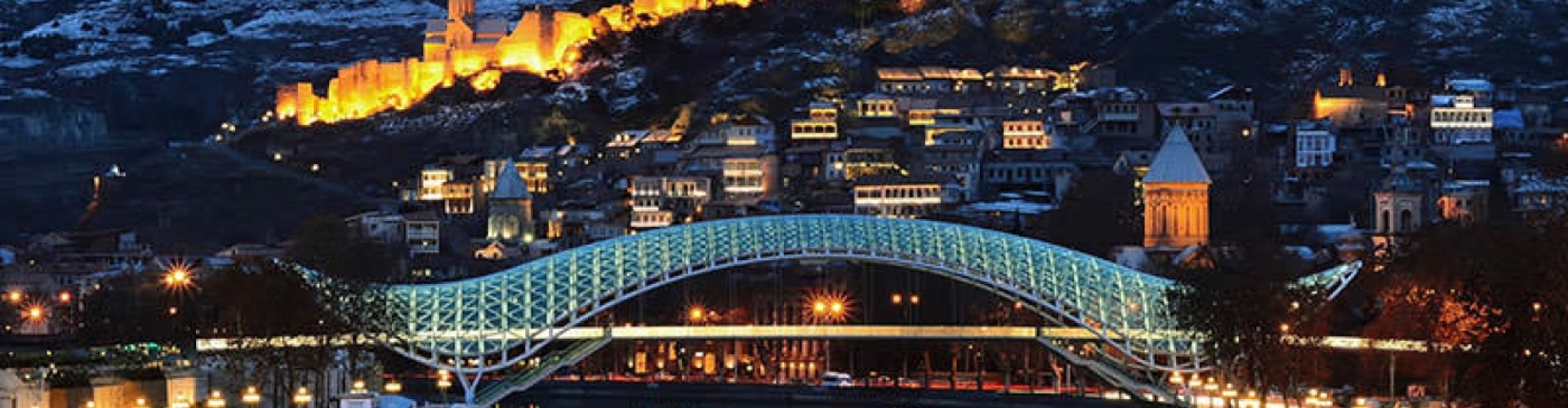 Tbilisi Night Skyline with Parked Cars