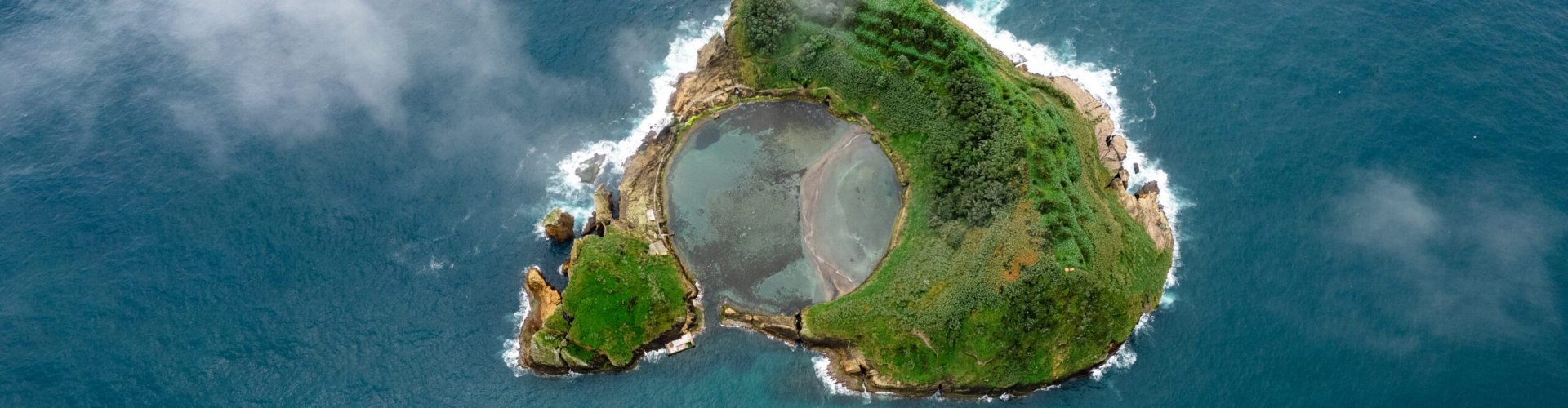 São Miguel night skyline with parked cars