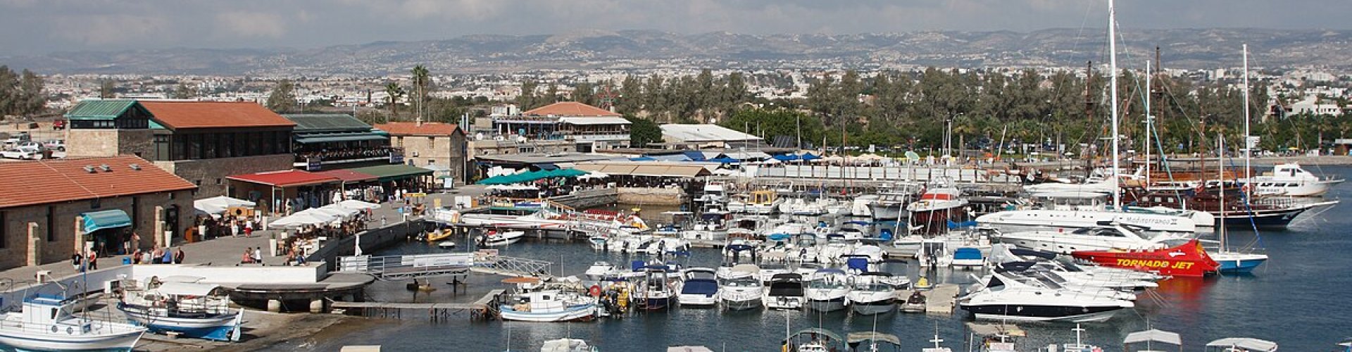 Paphos night skyline with parked cars