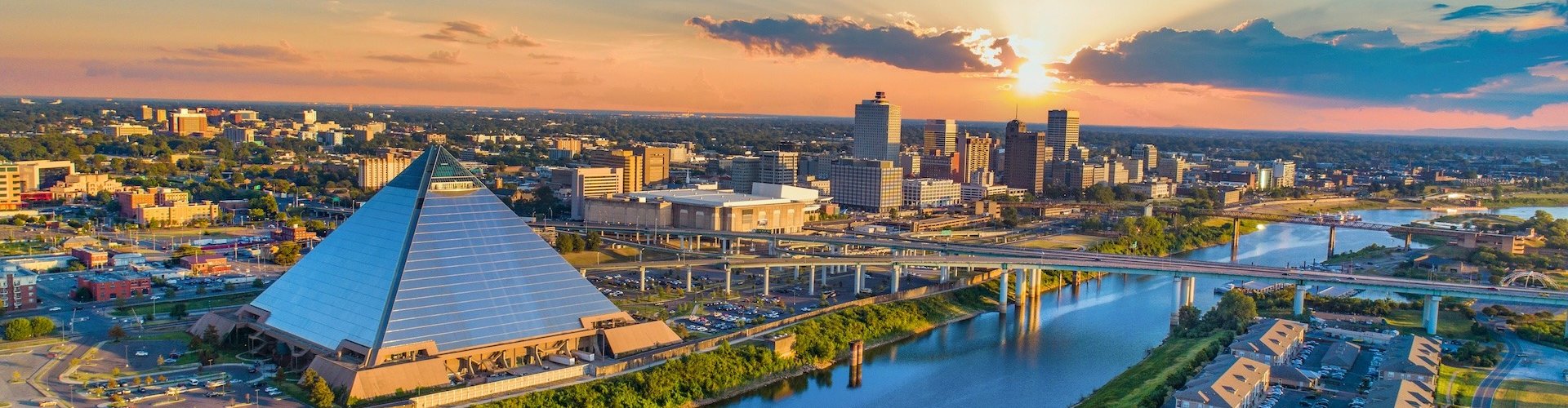 Memphis night skyline with parked cars