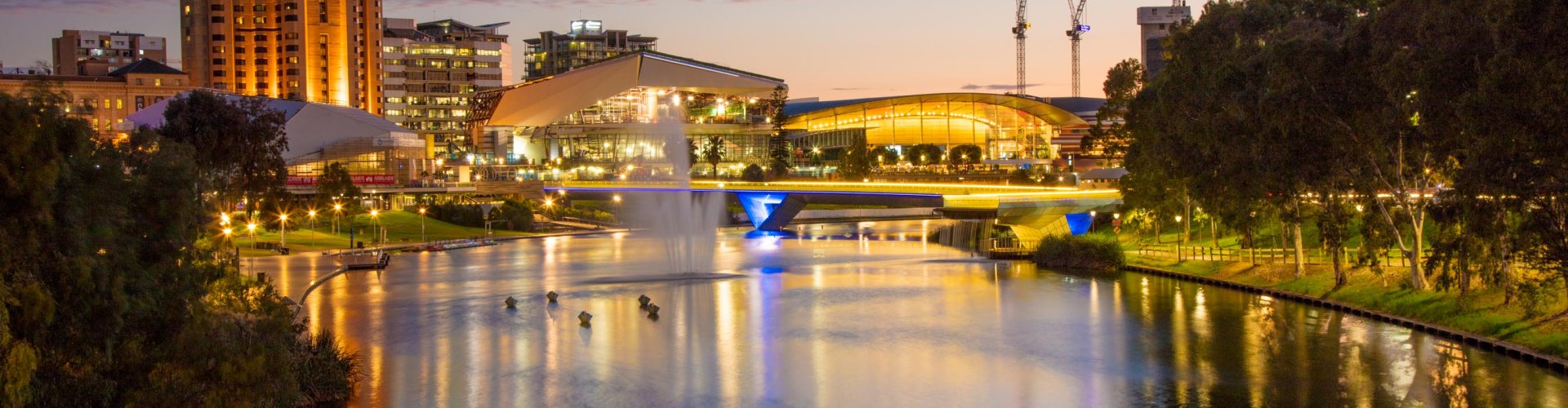 Adelaide night skyline with parked cars