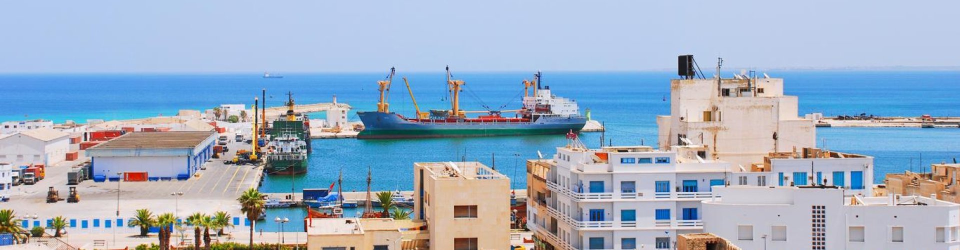 Night skyline with parked cars in Sousse, TN
