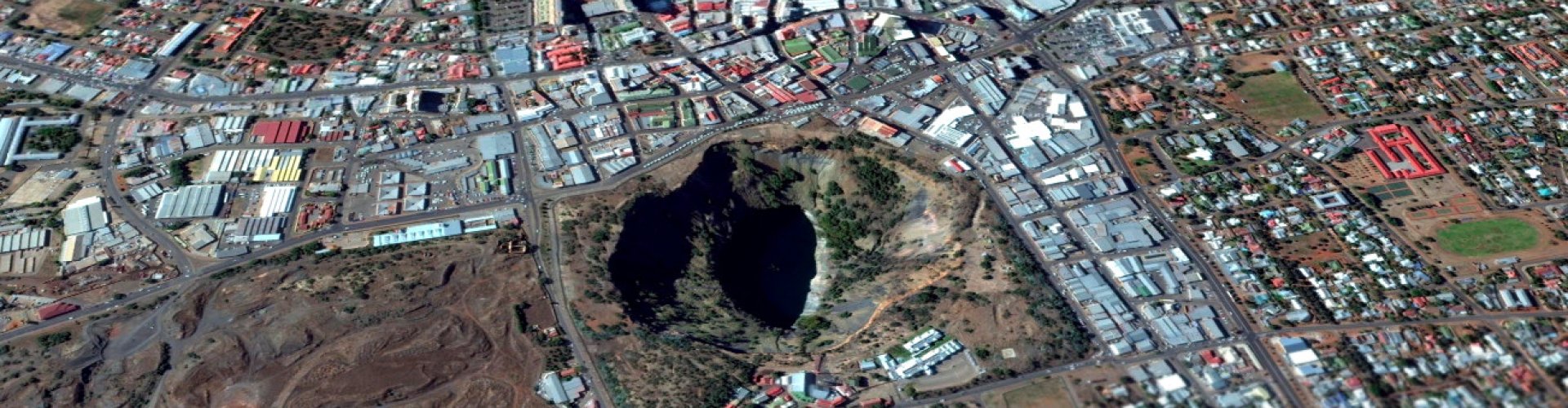 Kimberley night skyline with parked cars