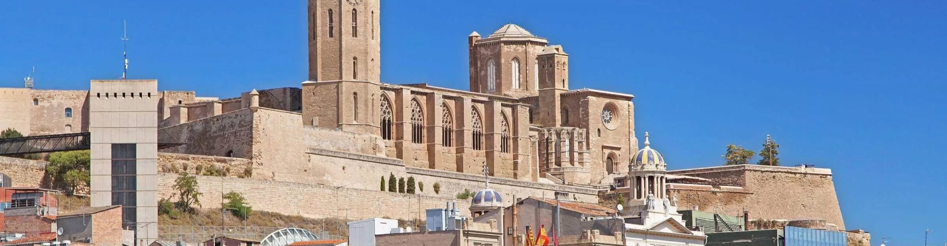 Lleida night skyline with parked cars