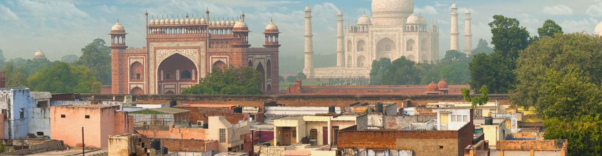 Agra night skyline with parked cars