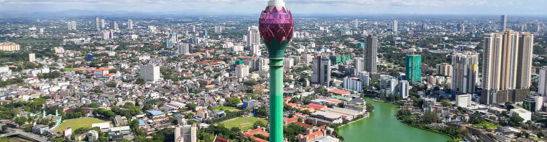 Colombo night skyline with parked cars
