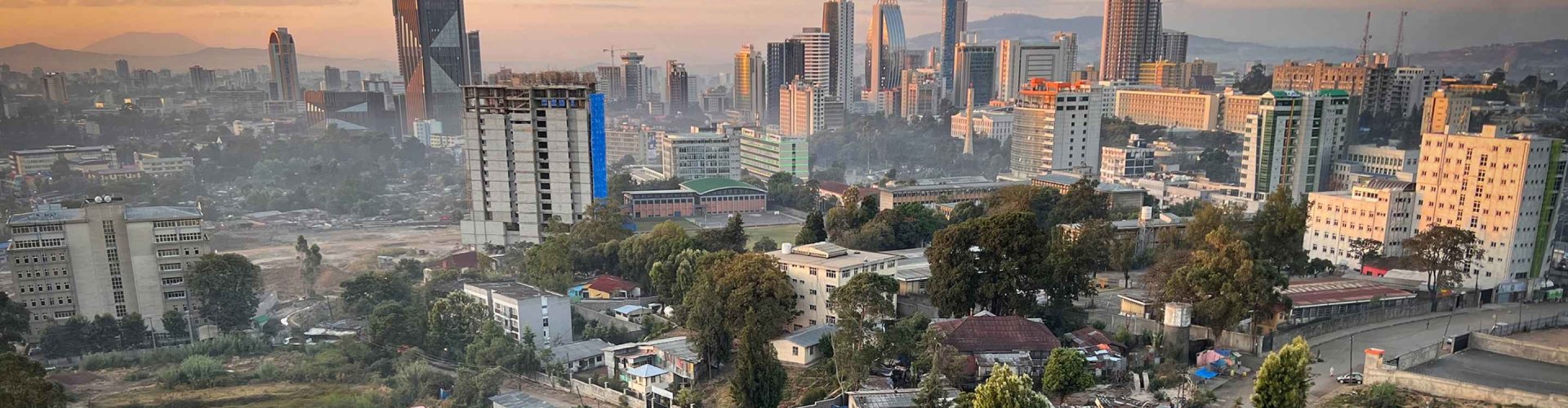 Addis Ababa night skyline with parked cars