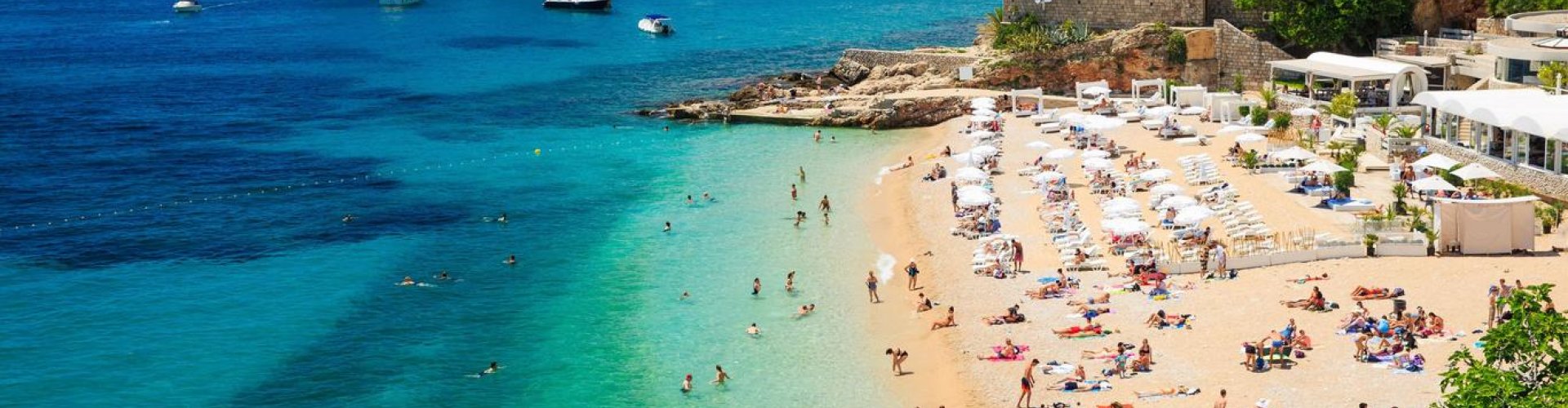 Dubrovnik night skyline with parked cars
