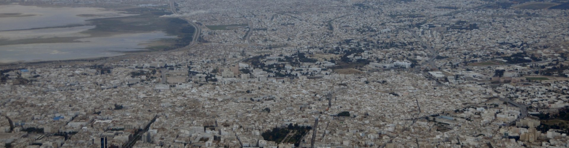 Tunis night skyline with parked cars