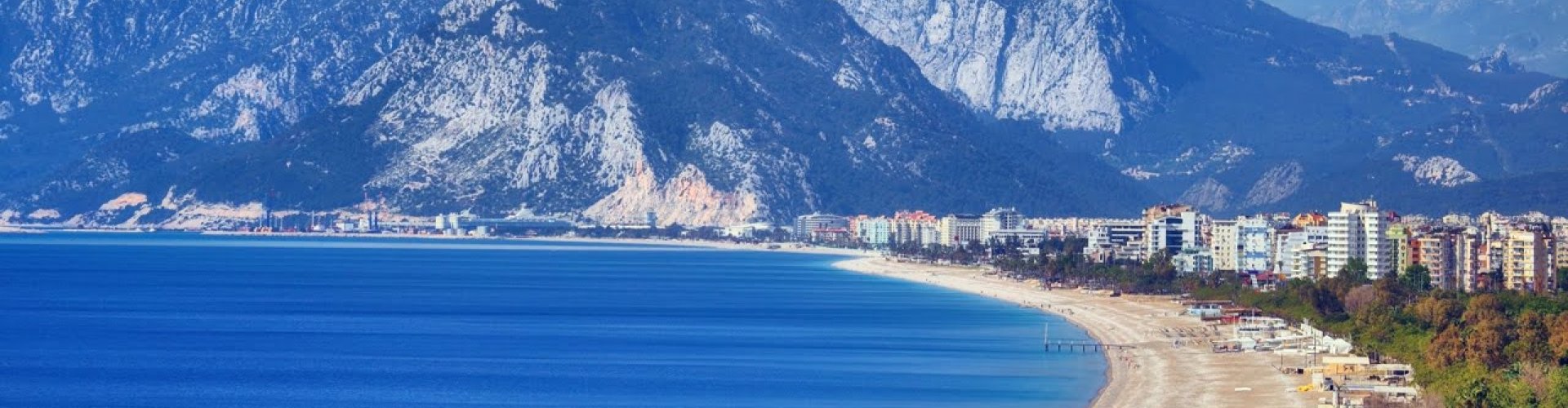 Antalya night skyline with parked cars